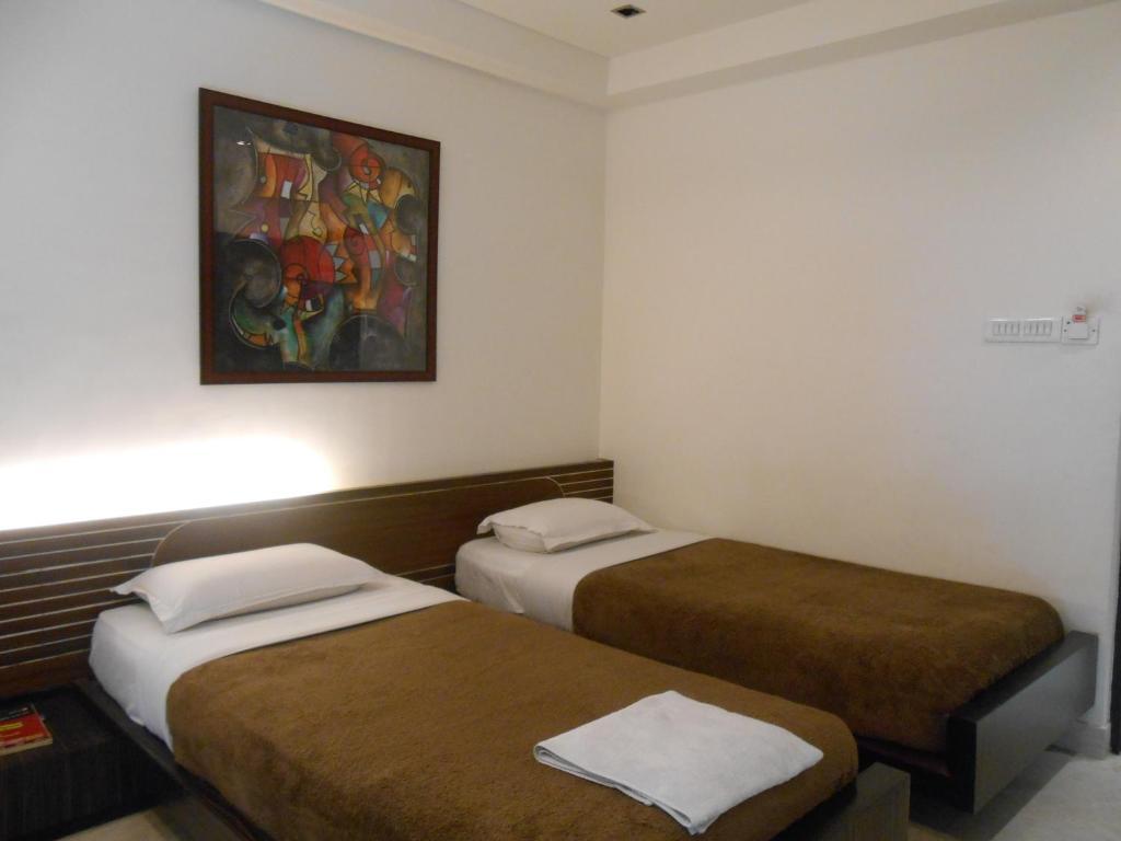 Hotel Victerrace Regency Калькутта Номер фото